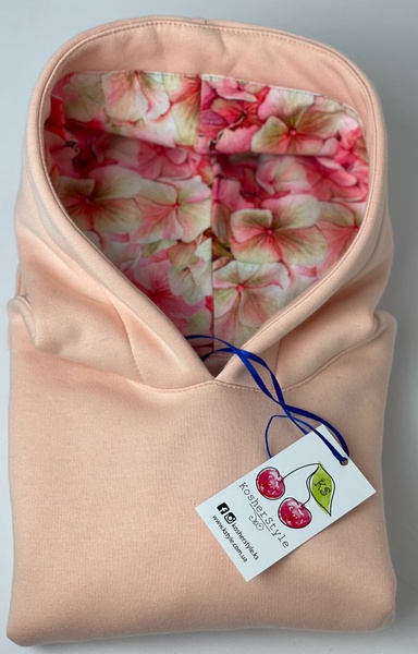 Дитяча сукня-худі з начосом та квітковим принтом в капюшоні відтінку Персик фото