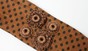 Повязка Ида коричневая с вязаными цветочками product-677 фото 2